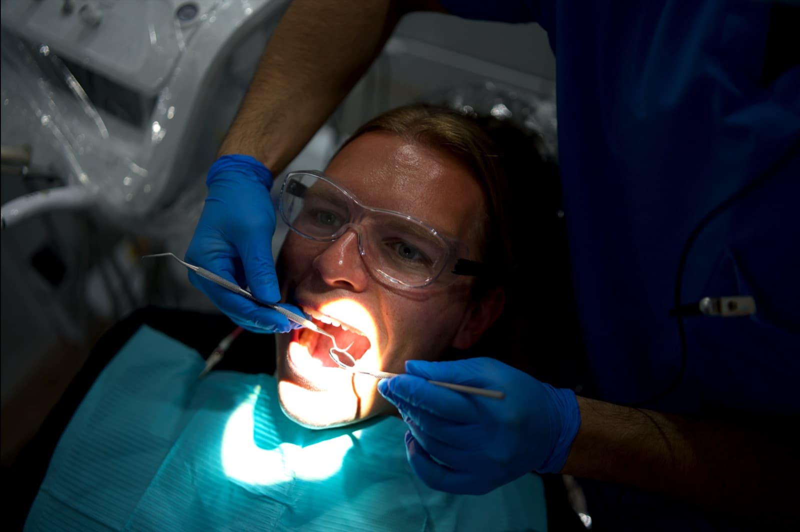 Close-up of a mobile dental exam with professional lighting and instruments